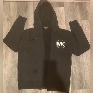 MICHAEL KORS BLACK ZIP UP SIZE MEDIUM.